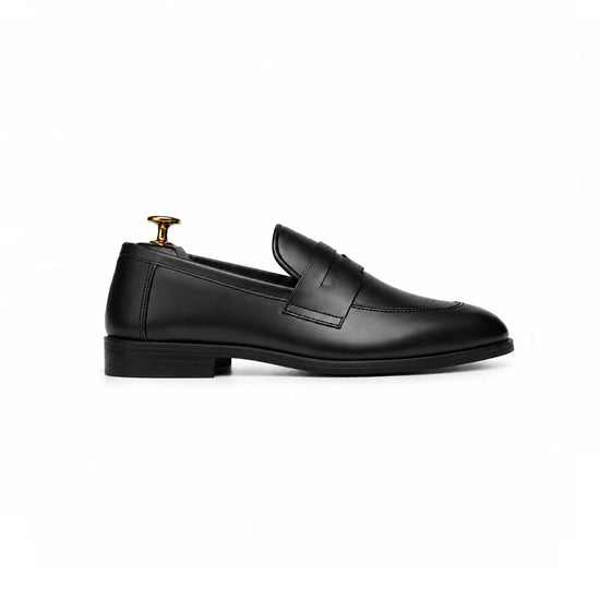 Black leather penny loafer, side profile