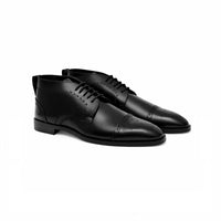 Black lace-up derby, angled view