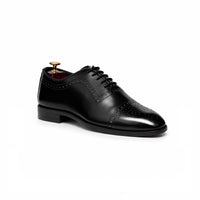 Black cap-toe oxford, angled view