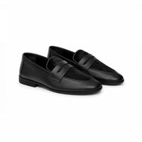 Black slip-on loafer, rear view
