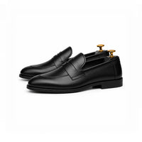 Black penny loafer, rear quarter view