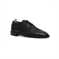 Black woven brogue oxford, angled view