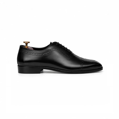 Black cap-toe oxford, side profile