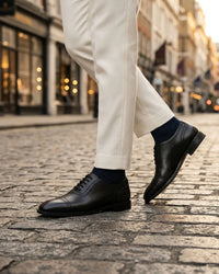 Black cap-toe oxford styled shot