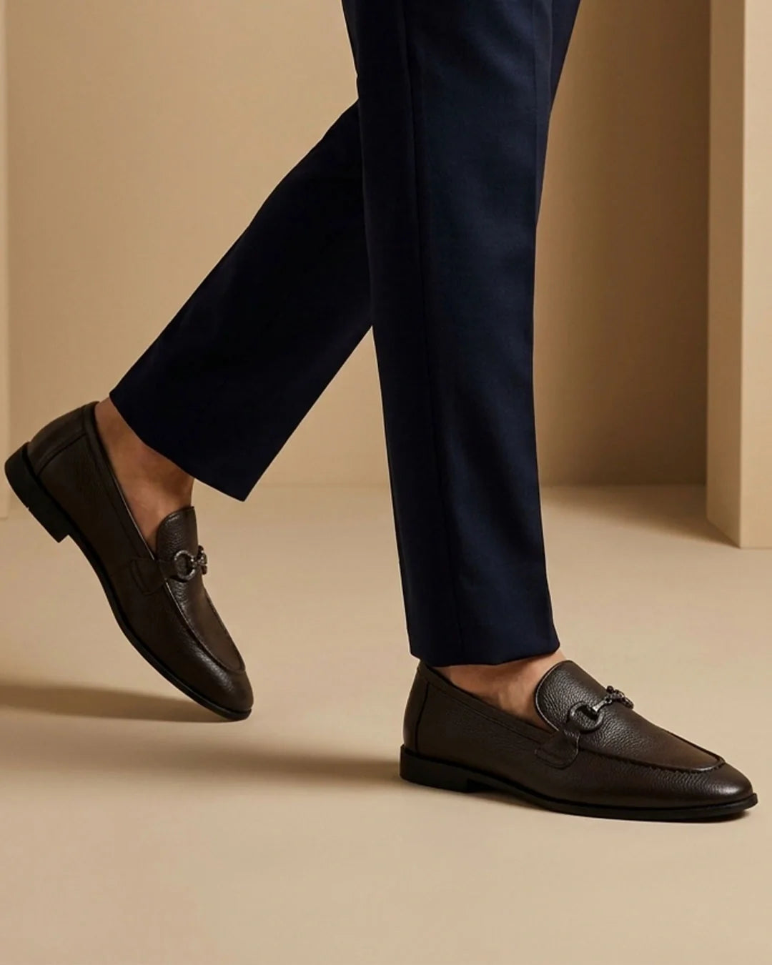 Brown penny loafer styled shot