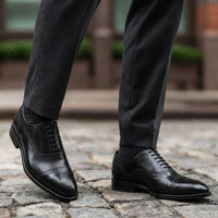 Black cap-toe oxford styled shot